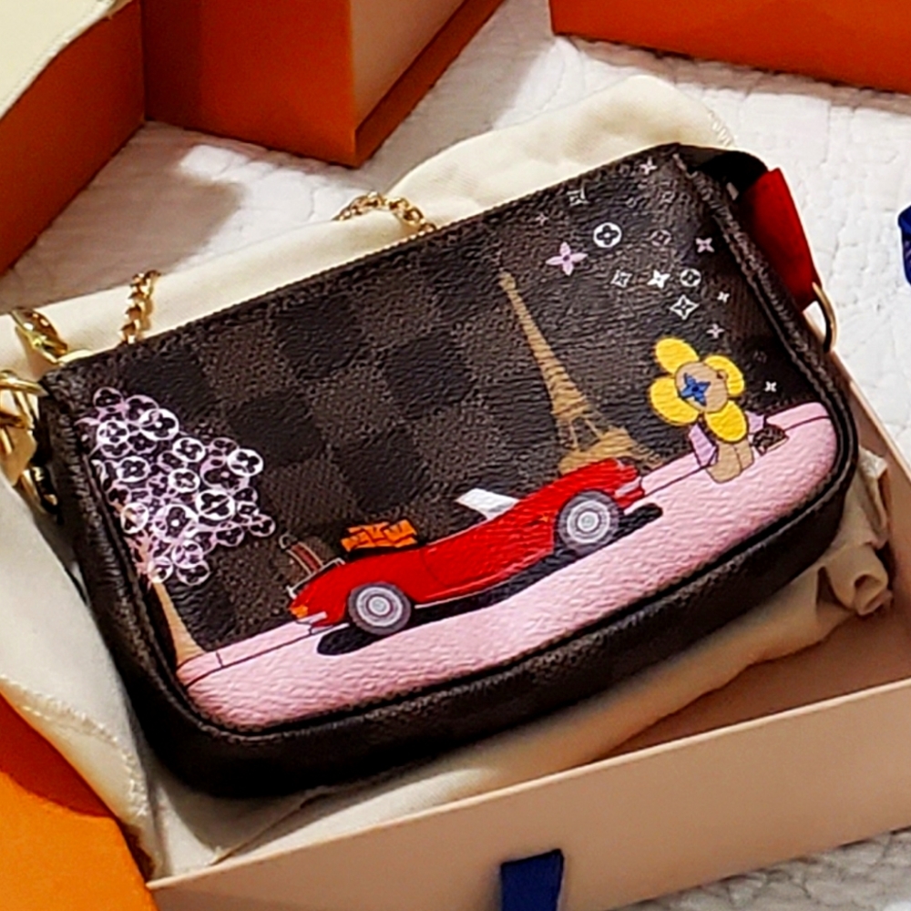 Louis Vuitton Limited Edition Christmas Vivienne Mini Pochette